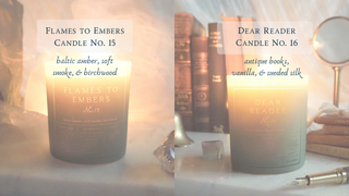 Two candles with labels 'Flames to Embers' and 'Dear Reader' on a surface.